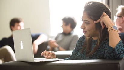 Student looking at a laptop