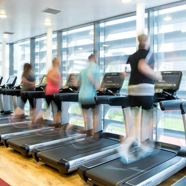 People working out on the treadmills in the Centre for Sport.