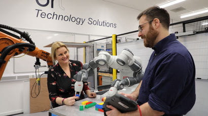 Researchers working in robotics