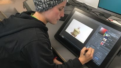 Animation student working on a tablet