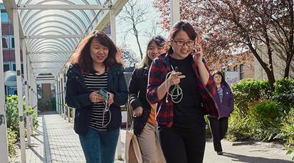 International students walking between lectures