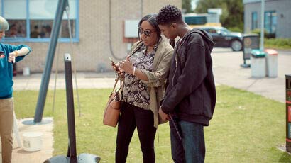 Prospective student with their parent at an open day