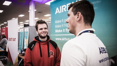 meet the employers fair Airbus representative talking to a student