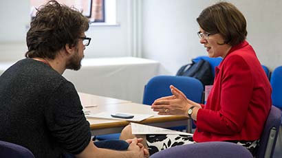 Student having a one-on-one conversation with a UWE Bristol staff member