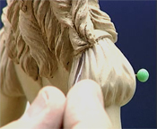 Detail of figurine being prepared for mould making