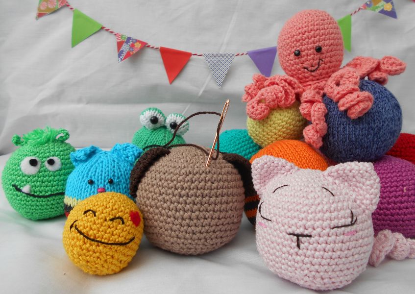 A group of crocheted animal toys