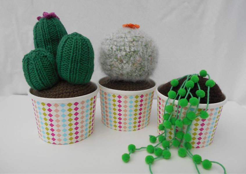Three crochet plants in pots