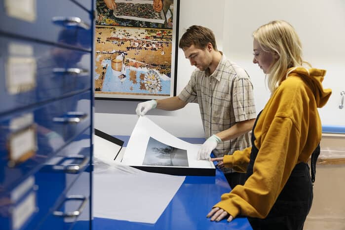 Curating student Jocelyn Gale with mentor Isaac Blease at Martin Parr Foundation, photo: Nathan Vidler