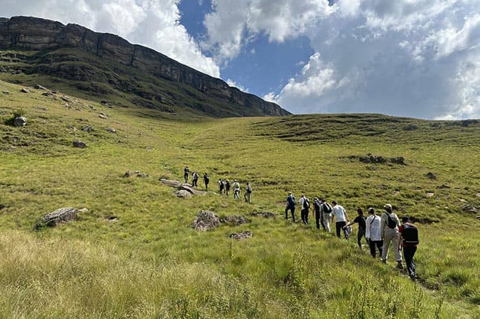 Students hiking in the Drakensberg National Park, South Africa, as part of the Year 3 Advanced Geographical Expedition module.