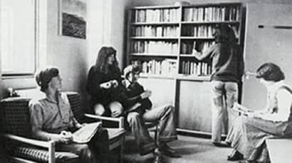 Vintage image of a group of students sitting in the quiet room of the Octagon.