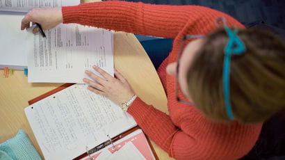 Aerial shot of a student writing an essay