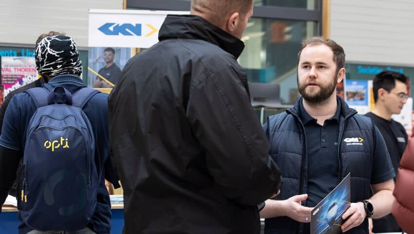 An employer and a student chatting at the engineering careers fair.