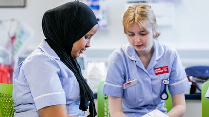 Two student nurses working in Glenside Hospital.