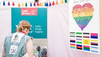 Closeup of a UWE Bristol stand at Bristol Pride.