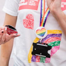 Closeup of a UWE Bristol staff member wearing a t-shirt at Bristol Pride.