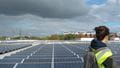 Katherine, who is studying a Masters in Multi Disciplinary Sustainable Development in Practice course looks at the solar panels on campus
