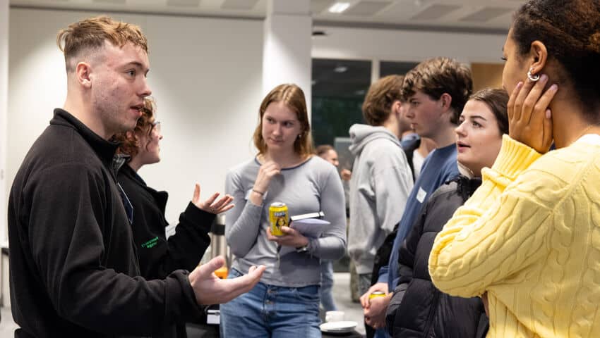 Students and industry experts networking at the GEM ask the experts event.