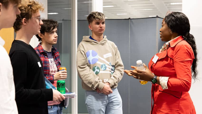 Students and industry experts networking at the GEM employer event.