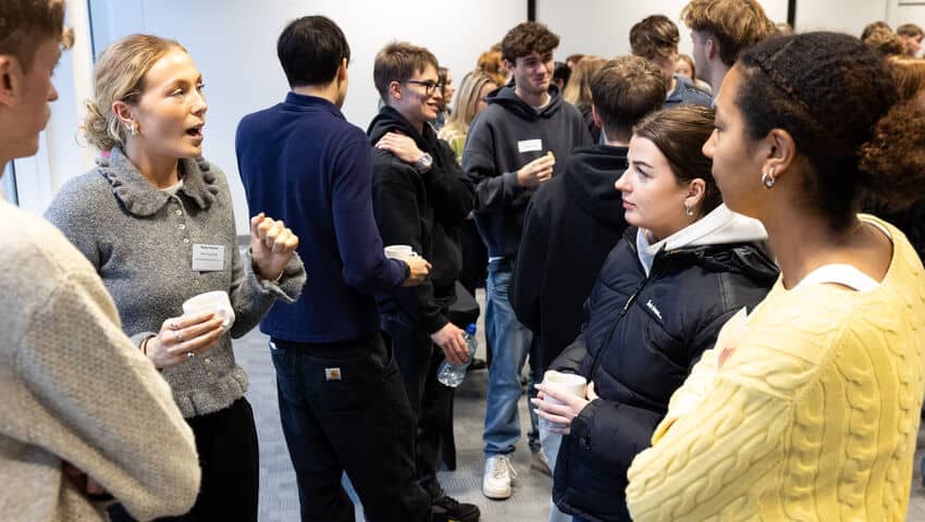 Students and industry experts networking at the GEM employer event.