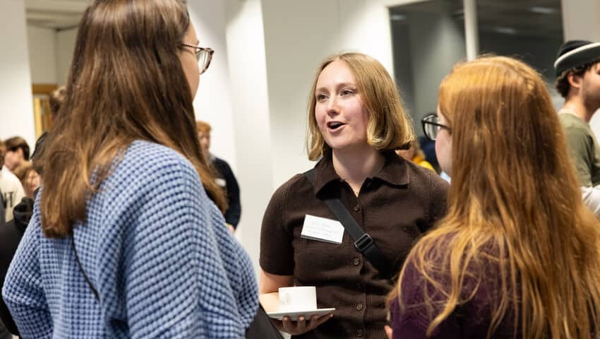 Students and industry experts networking at the GEM employer event.