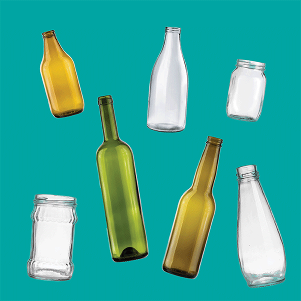 A selection of green, yellow and clear glass bottles, which can be put into glass recycling bins.