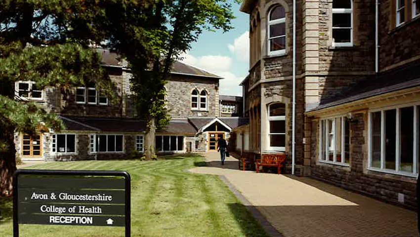 Main entrance with old Avon & Gloucestershire College of Health signage, circa 1990.