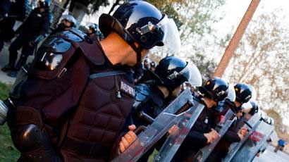 Police forces in a row with protective equipment