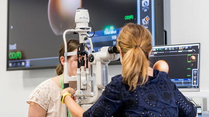 Optometry demonstration in a classroom.