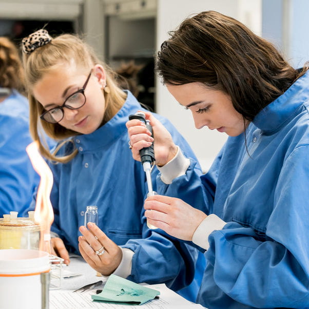 Students working in a science lab