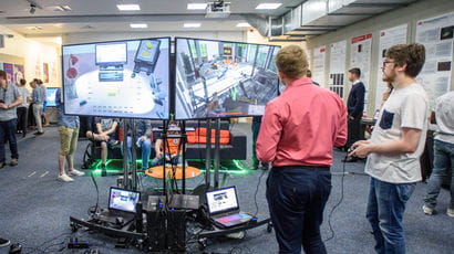 Students trying out computer game at UWE Bristol