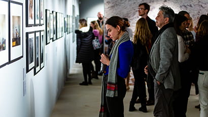 People at a photography exhibition.