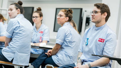 Group of student nurses on a ward.