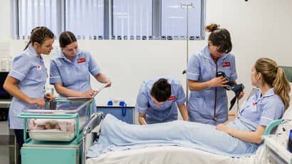 Student midwives training on a ward.