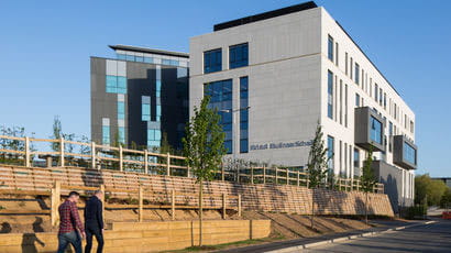 People walking towards Bristol Business School.