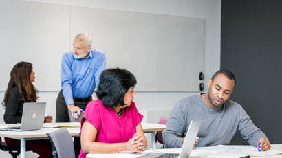 Two groups of people working together.