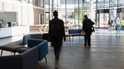 People walking in Bristol Business School.