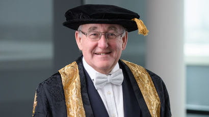 Chancellor, Ian Carruthers in a gown
