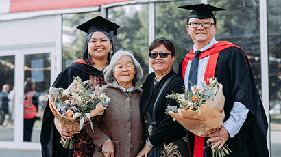 Photograph of the Chu family at graduation.