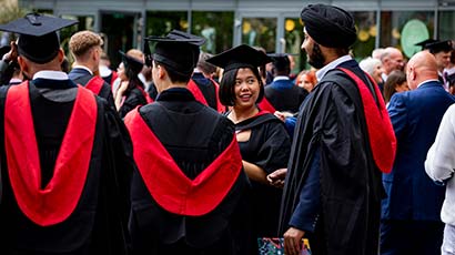 Graduating students in their gowns.