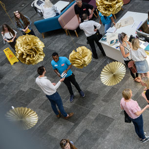 Participants attending an exhibition on Frenchay Campus.