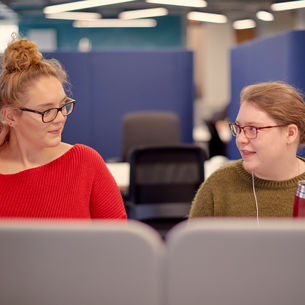 Two students working on computers