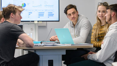 Students working in a study room.