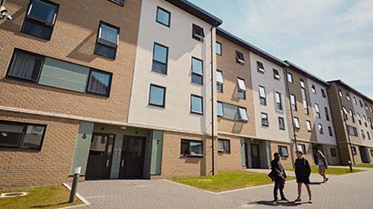 Students standing outside Wallscourt Park accommodation