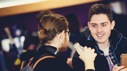 Two students having a conversation