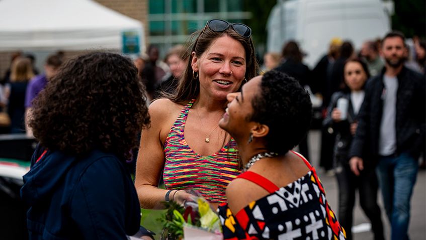 A group of student laughing together at Bower Ashton City Campus