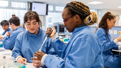 Students working in a lab.