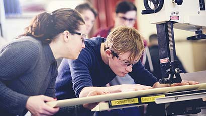 Two students using facilities in the Engineering department