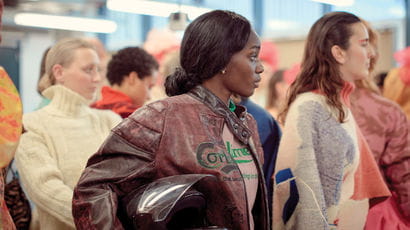 Models wearing clothes made by a fashion student