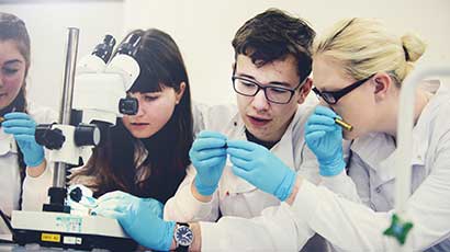 Forensic science students in a lab