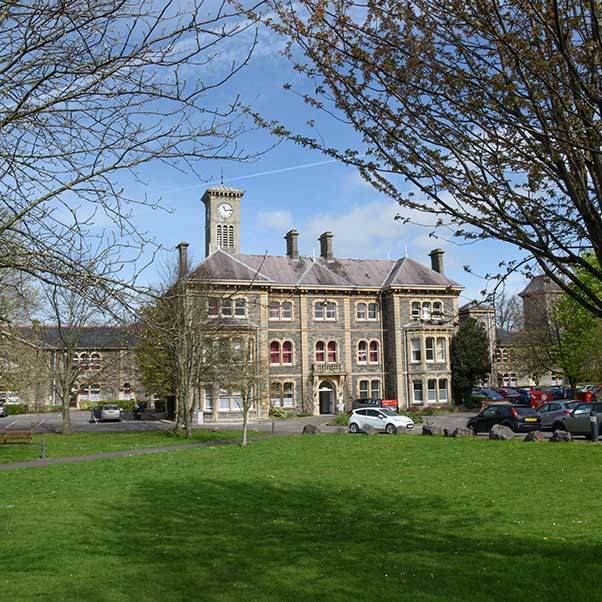 A building and car park on Glenside Campus.